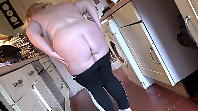 Fat slut Megan masturbates solo while standing