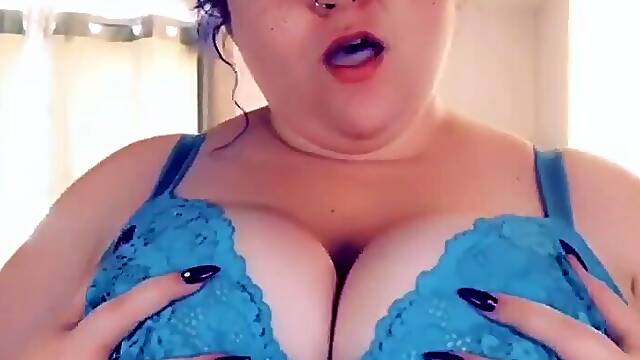 Hot and curvy smoker with big natural tits
