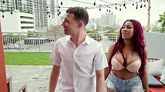 BBW ebony redhead bounces on a giant white johnson