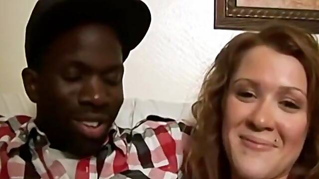 Thick breasty white doxy takes on a large ebony dick