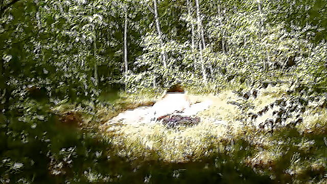 Sexy German BBW fingering her pussy in the middle of the woods