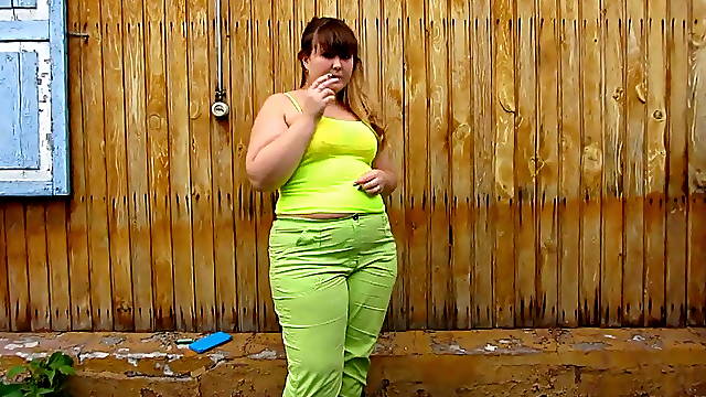 Chubby woman peeing in her pants