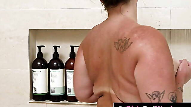 Curvy lesbians with big boobs fuck in the bathroom