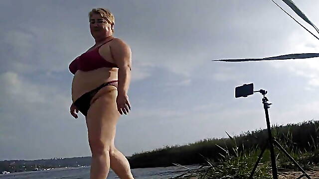 Mother-in-law sucks my dick on the beach and gets cum in her mouth