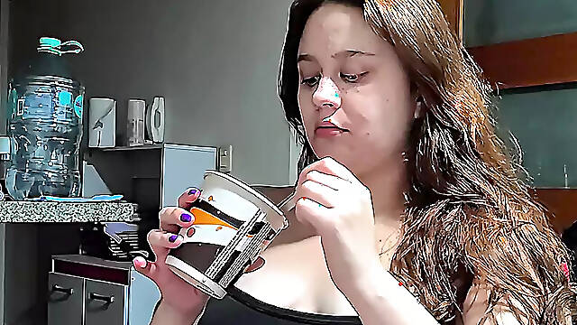 Hot Chubby Woman Filling Her Round Belly with Some Sweets