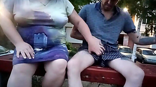Jerking off my cock in the yard on a bench