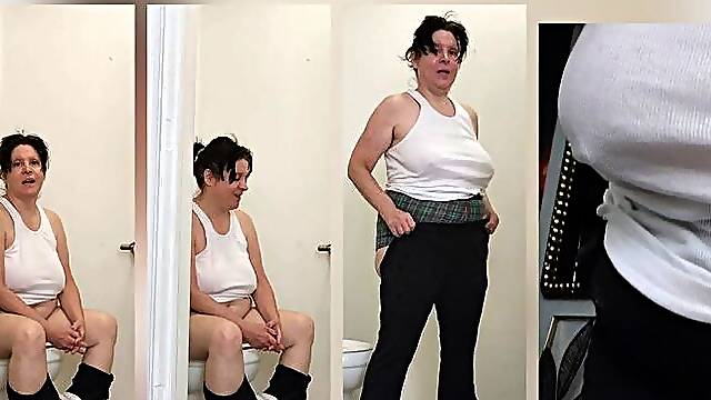 ELLES Tuesday Pee wearing a White Tank Top and Black Yoga Pants