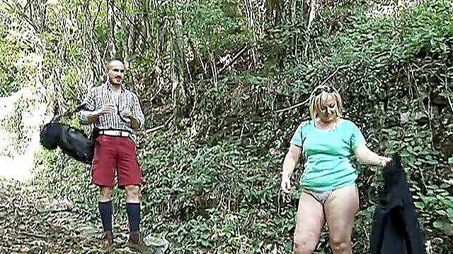 Blonde mature fucked by young cock in the woods