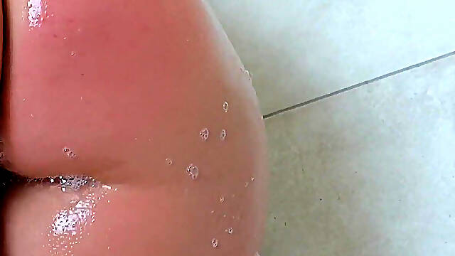 Chubby MILF in Clothes in the Shower. Water Masturbation.